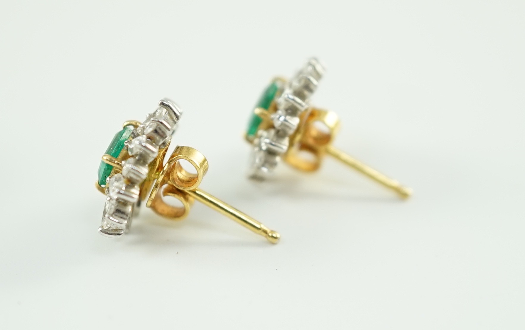 A modern 18k gold emerald and diamond set suite of jewellery